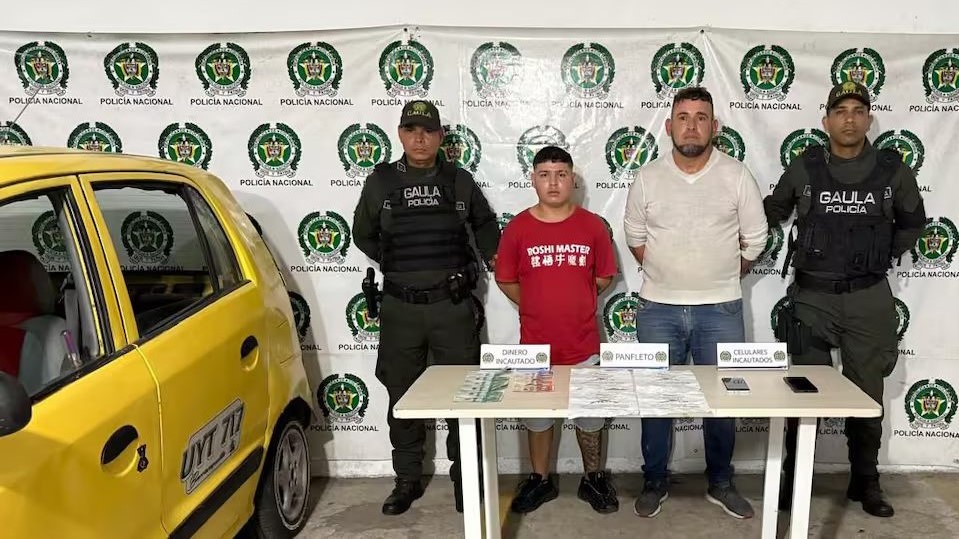 Presuntos extorsionistas en el centro de Barranquilla.