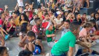 Niños realizando el quinto día de la novena en Santa María. 