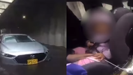 Agente de tránsito salvó a bebé atrapada en un carro durante inundación en Bogotá