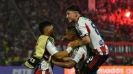 Fabián Ángel celebrando el primer gol de Luis Fernando Muriel frente a Nacional. Edwin Herrera se unió al festejo.