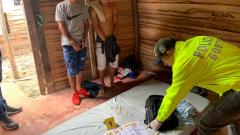 Alias Cuatro dedos y alias Minimí durante el momento de su captura.