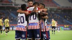 Jugadores de Junior celebrando un gol.