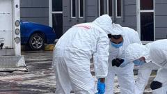 CTI recogiendo un cadáver.