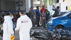 Miembros del CTI realizando un levantamiento de cadáver en Barranquilla.