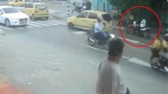 Jairo Antonio Porta Conrado, de 33 años, estaba estacionado sobre la vía, justo unos metros antes del semáforo, usando su teléfono celular cuando fue atacado. 