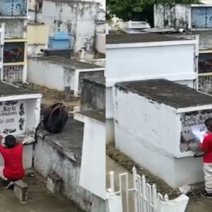 Momento en el que el niño se encuentra frente la tumba de su mamá.