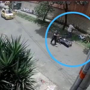 Momentos en el que el taxista le dispara al sujeto. 