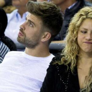 Shakira y su expareja en un juego de basquetbol. 