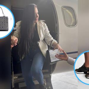 Aida Merlano en su aterrizaje en el aeropuerto El Dorado, con varias prendas de la marca Louis Voutton.