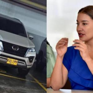 Jacqueline Rojas y la camioneta que fue robada durante este viernes en el norte de Barranquilla. 