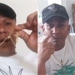 Alias Negro Ober exhbiendo un reloj de oro y fumando un tabaco de marihuana