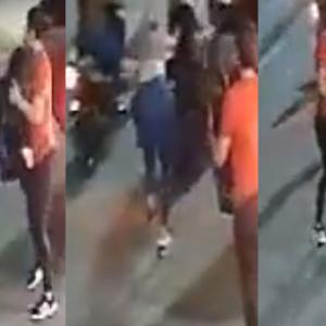 El momento exacto en el que toman a la mujer embarazada del pelo