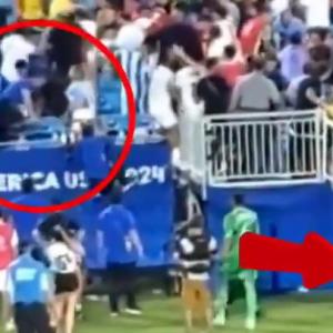 Rodrigo Betancur lanzando la botella que hirió a Santiago Ferro, PF de la selección uruguaya