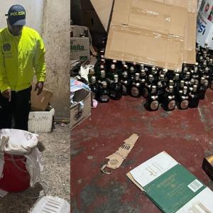 Un policía inspecciona el sitio donde se hallaron elementos para la elaboración del licor adulterado.