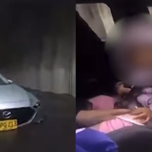 Agente de tránsito salvó a bebé atrapada en un carro durante inundación en Bogotá