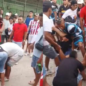 Momentos en que una de las víctimas era auxiliada por los moradores del sector.