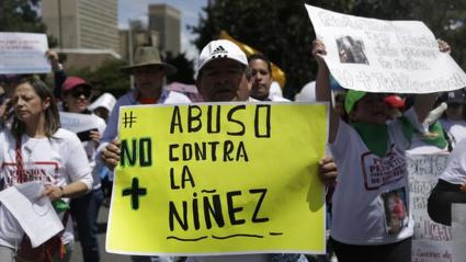 Imagen de referencia de marcha contra la violencia a la niñez 