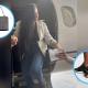 Aida Merlano en su aterrizaje en el aeropuerto El Dorado, con varias prendas de la marca Louis Voutton.