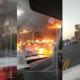 Aspecto de la quema de los buses en una de las carreteras del departamento